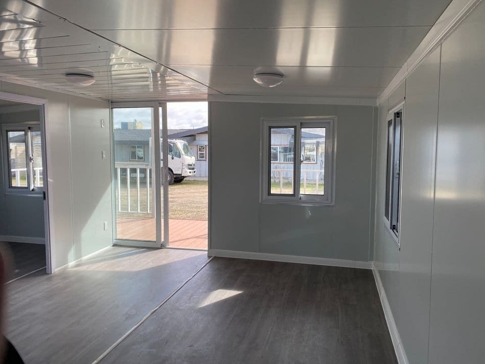 Expandable interior looking toward glass front doors and the porch.