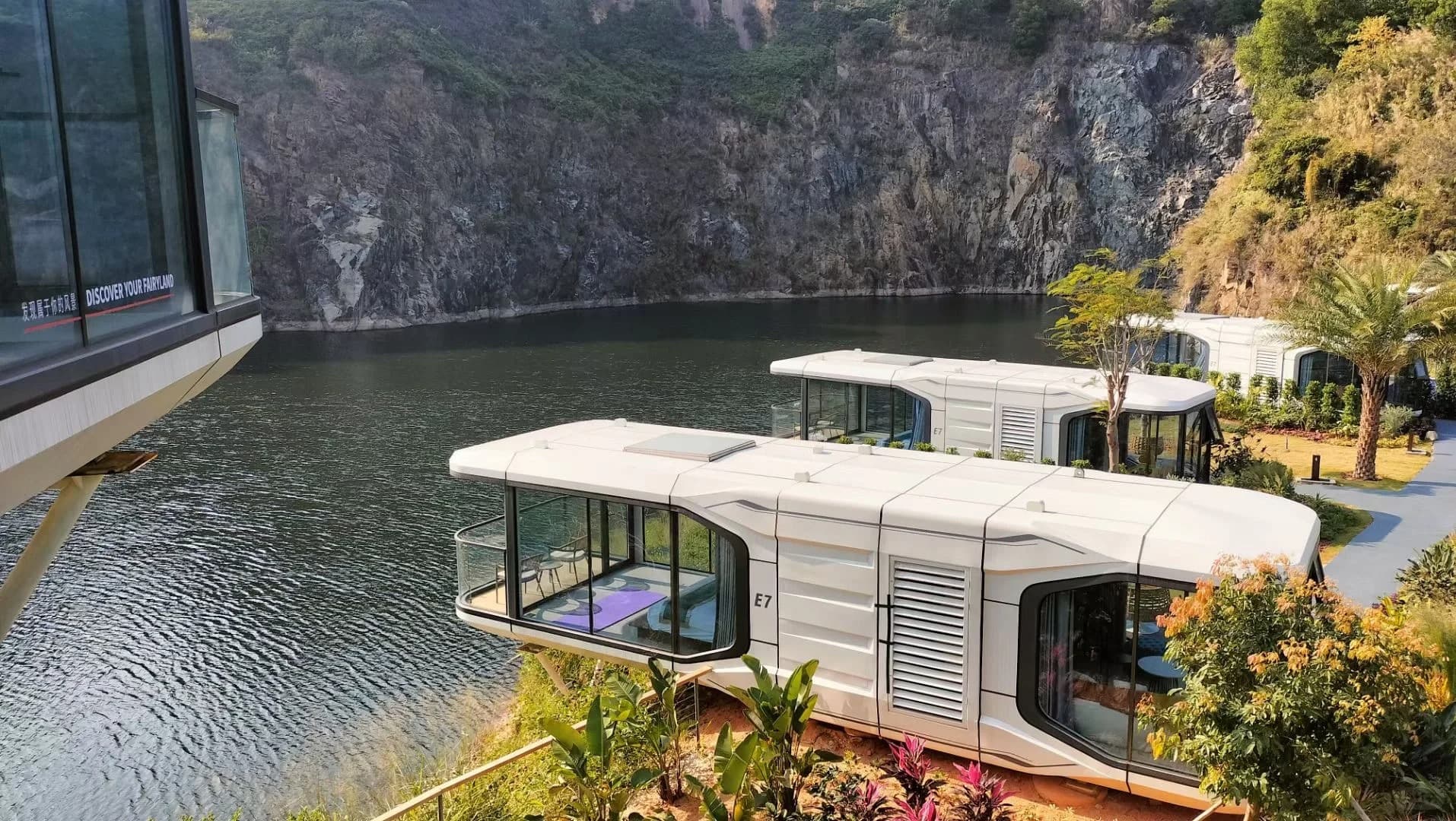 Space Capsule pods beside a quarry lake.