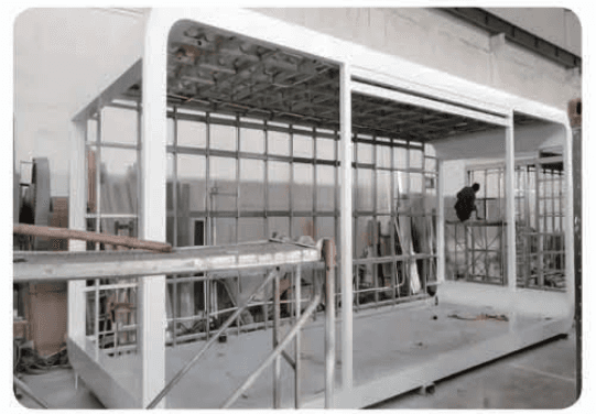 Steel frame of an Apple Cabin under construction.